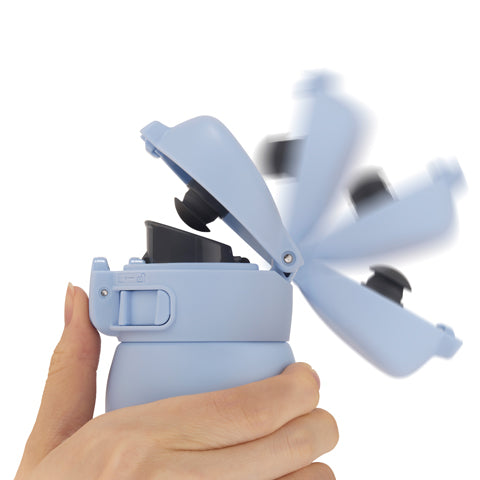 Flip-lid keeps sip spout clean when closed