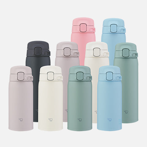 Set of colorful thermos bottles on a white background