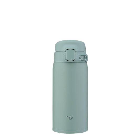Green thermos bottle on a white background