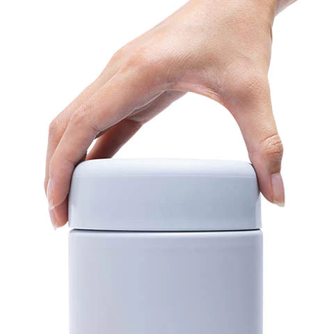 Uniquely designed lid relieves pressure created by hot foods as it is opened