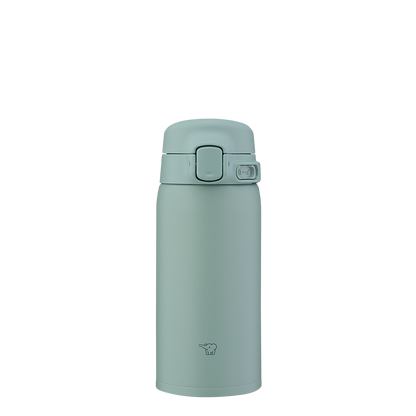 Green thermos bottle on a white background