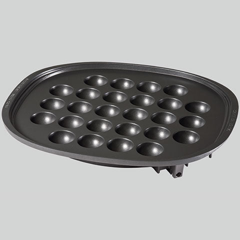 Sold separately, this unit has a Takoyaki plate accessory (EA-YBC01), which can make up to 26 large takoyaki at a time
